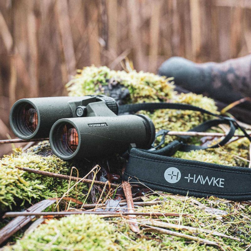 The Hawke Frontier APO 8x42 Binoculars with carry and neck strap, used in nature